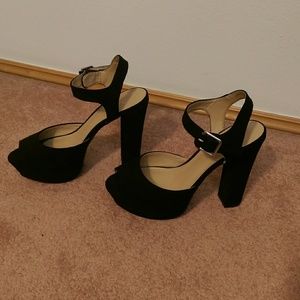 Black peep toe pumps